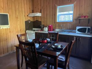 Kuchyň nebo kuchyňský kout v ubytování Chalets du Domaine Yamaska