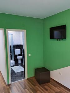 TV a/nebo společenská místnost v ubytování Rooms Modrušan