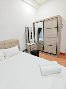 Lova arba lovos apgyvendinimo įstaigoje Platino Residences 1min to Paradigm mall hotel style 1bedrooms Cozy
