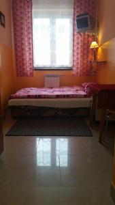 Łóżko lub łóżka w pokoju w obiekcie Noclegi Relax