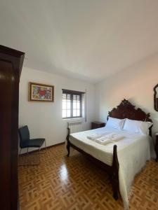 Posteľ alebo postele v izbe v ubytovaní Casa da Clô