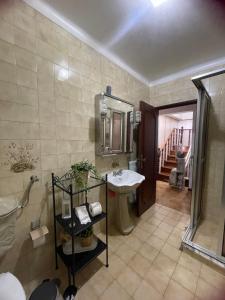 Kúpeľňa v ubytovaní Casa da Clô