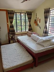 Postel nebo postele na pokoji v ubytování ARANYAK homestay