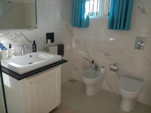 Kylpyhuone majoituspaikassa Villa Dario