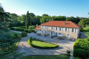 an aerial view of a house with a garden at Domaine de Laguneaussan in Lesparre-Médoc