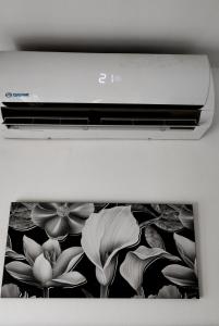 a laptop screen with a picture of flowers on it at APARTMENT kitchen BOLOGNA in Bologna