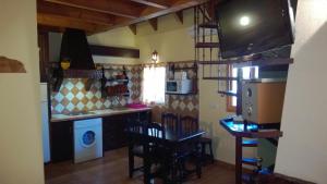 Кухня или мини-кухня в Casas El Suspiro
