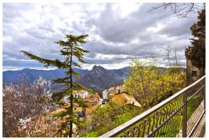 a view from a balcony of a town and a mountain at B&B La Bella Vista in Albano di Lucania