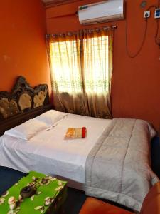 Giường trong phòng chung tại Hotel Al-Hayat Abasik