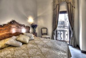 Voodi või voodid majutusasutuse Hotel Scandinavia - Relais toas