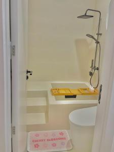 Ein Badezimmer in der Unterkunft Jeju Homestay