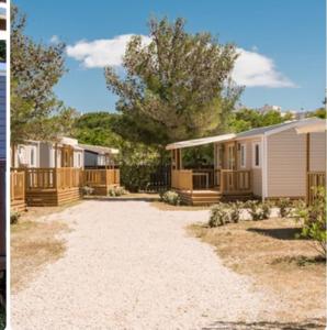 una fila de casas móviles estacionadas en un patio en Mobil home Canet Roussillon 4 étoiles le Mar Estang 8 pers en Canet-en-Roussillon