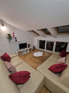 Predel za sedenje v nastanitvi Apartment Lea