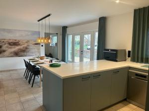 Köök või kööginurk majutusasutuses Duinzand