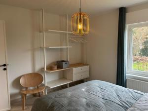 Voodi või voodid majutusasutuse Duinzand toas