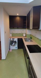 Kuchyň nebo kuchyňský kout v ubytování Apartamenty Jagiełło