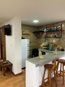 Η κουζίνα ή μικρή κουζίνα στο FLATS SHALON - MORRO DE SÃO PAULO