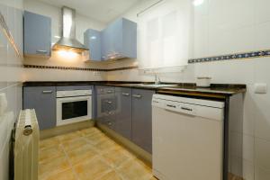 A kitchen or kitchenette at Apartamento Céntrico