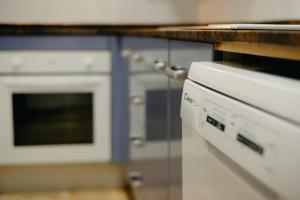 A kitchen or kitchenette at Apartamento Céntrico