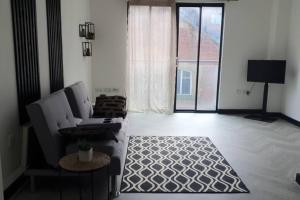 Кът за сядане в Stunning Central Apartment, Leicester City Centre