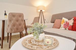 a living room with a coffee table and a couch at La Mar Mar in Kotor