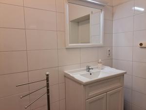 Ένα μπάνιο στο Strandferienwohnung am Scharmützelsee +7 φωτογραφίες
