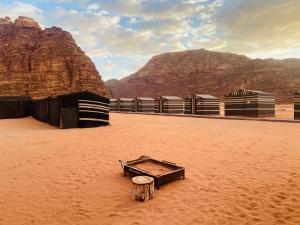 a toolbox in the desert with mountains in the background at Wadi Rum Jordan Camp in Wadi Rum