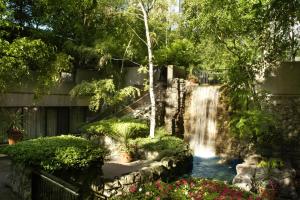 a waterfall in a landscaped yard with a waterfall at Sheraton Centre Toronto Hotel in Toronto