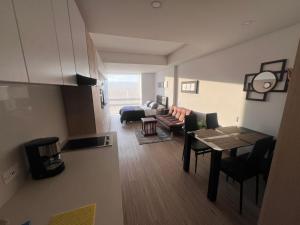 a living room with a couch and a table at Solar 1117 in Chía