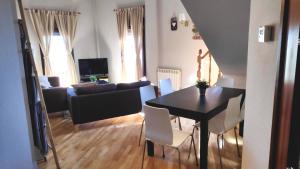 TV a/nebo společenská místnost v ubytování Apartamentos GO - Tordesillas House