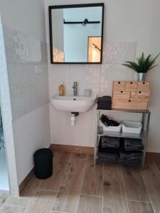 Koupelna v ubytování L'étable + 3 fotografie