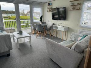 Televisyen dan/atau pusat hiburan di Cleethorpes beach haven site