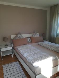 Un pat sau paturi într-o cameră la Haus Toni