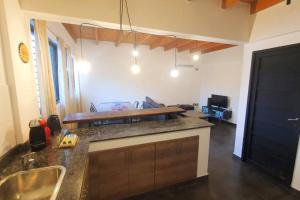 Køkken eller tekøkken på El depa de Nico + 13 billeder