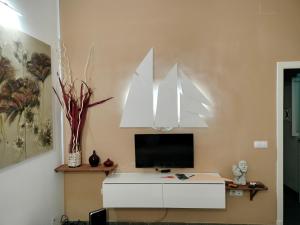 A television and/or entertainment centre at El rinconcito de Robles