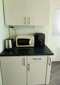 Cucina o angolo cottura di Lovely apartment in the center of Ryd