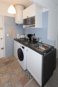 Η κουζίνα ή μικρή κουζίνα στο Studio Cosy Chaville