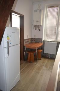 Η κουζίνα ή μικρή κουζίνα στο Apartament Nicolae Iorga RHBM +7 φωτογραφίες