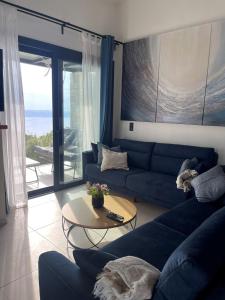 Damari Luxury Retreat Villas Skiathos的休息区