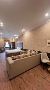 Posezení v ubytování سيبار للشقق المخدومة Sippar Serviced Apartments + 22 fotografií
