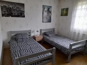 Ένα ή περισσότερα κρεβάτια σε δωμάτιο στο Villa Amazone