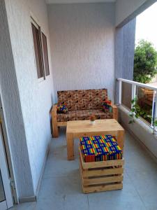 Χώρος καθιστικού στο Appartement chambre salon Kégué Stade