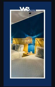 zdjęcie pokoju hotelowego z dwoma łóżkami w obiekcie WE Hotel, La Lima w mieście La Lima