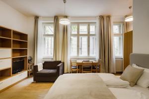 Posteľ alebo postele v izbe v ubytovaní Deluxe suite in prime location