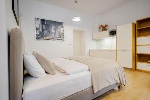 Posteľ alebo postele v izbe v ubytovaní Deluxe suite in prime location