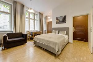 Posteľ alebo postele v izbe v ubytovaní Deluxe suite in prime location