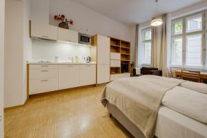Posteľ alebo postele v izbe v ubytovaní Deluxe suite in prime location