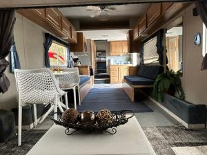 a living room and kitchen of an rv at Retreat (rinconcito) in Hildale