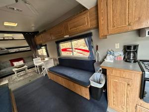 an interior view of an rv with a counter and a kitchen at Retreat (rinconcito) in Hildale