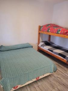 מיטה או מיטות בחדר ב-Casa quinta , ideal descanso
